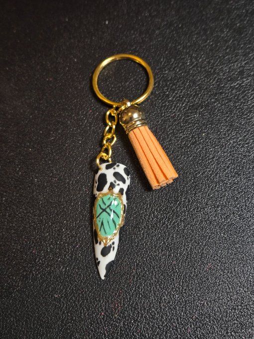 Porte clés fait mains. Modèle vache.